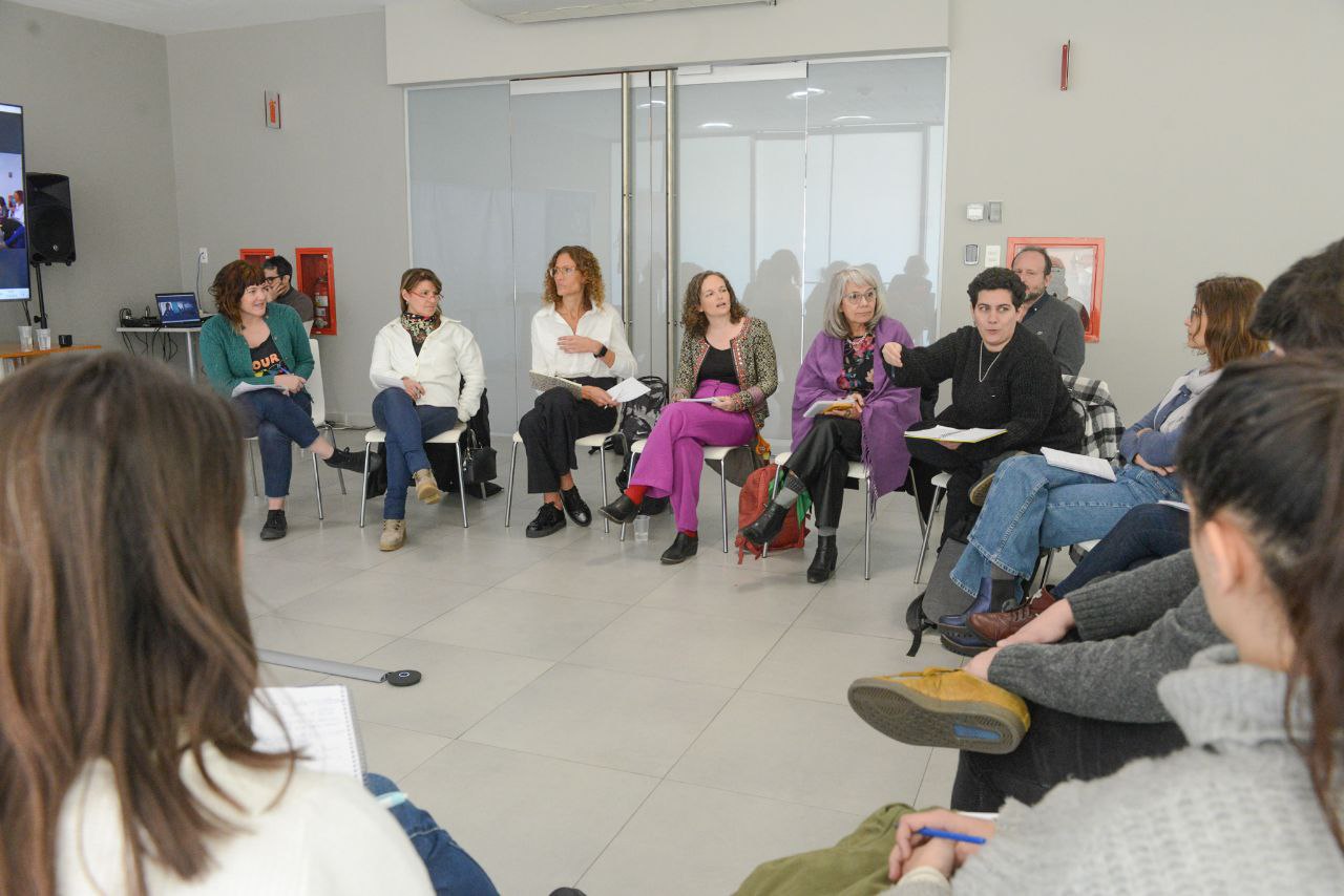 Image of a group of people gathered in a circle